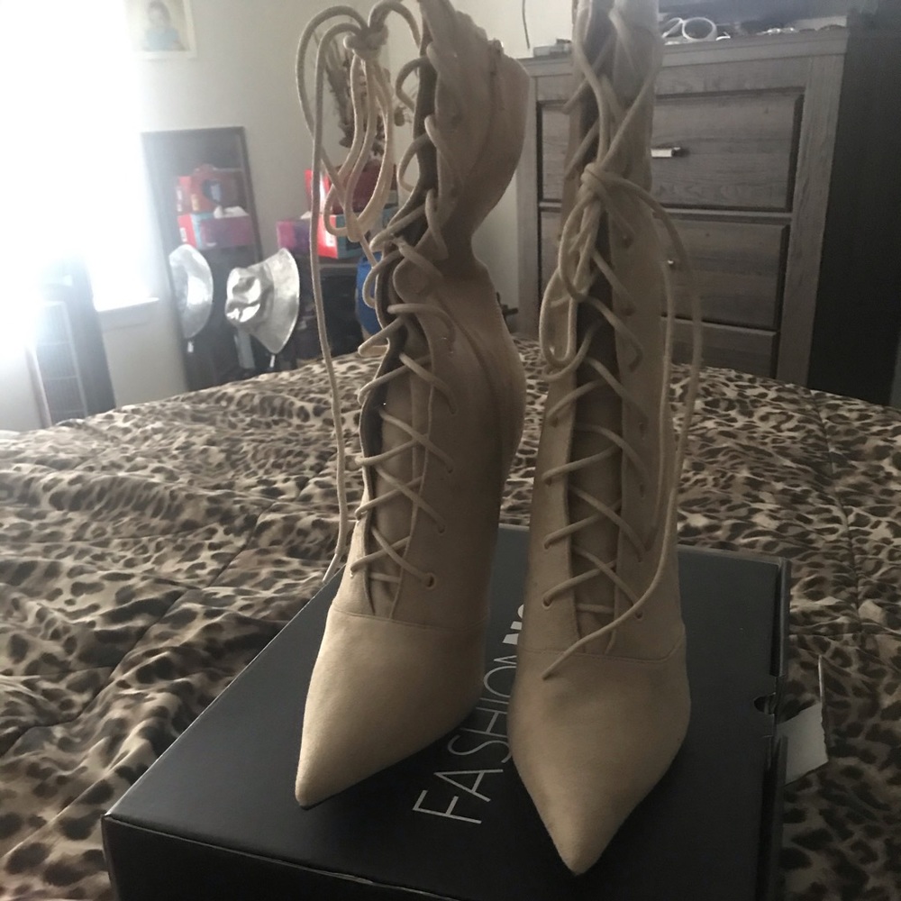 Tan sued ankle boots.